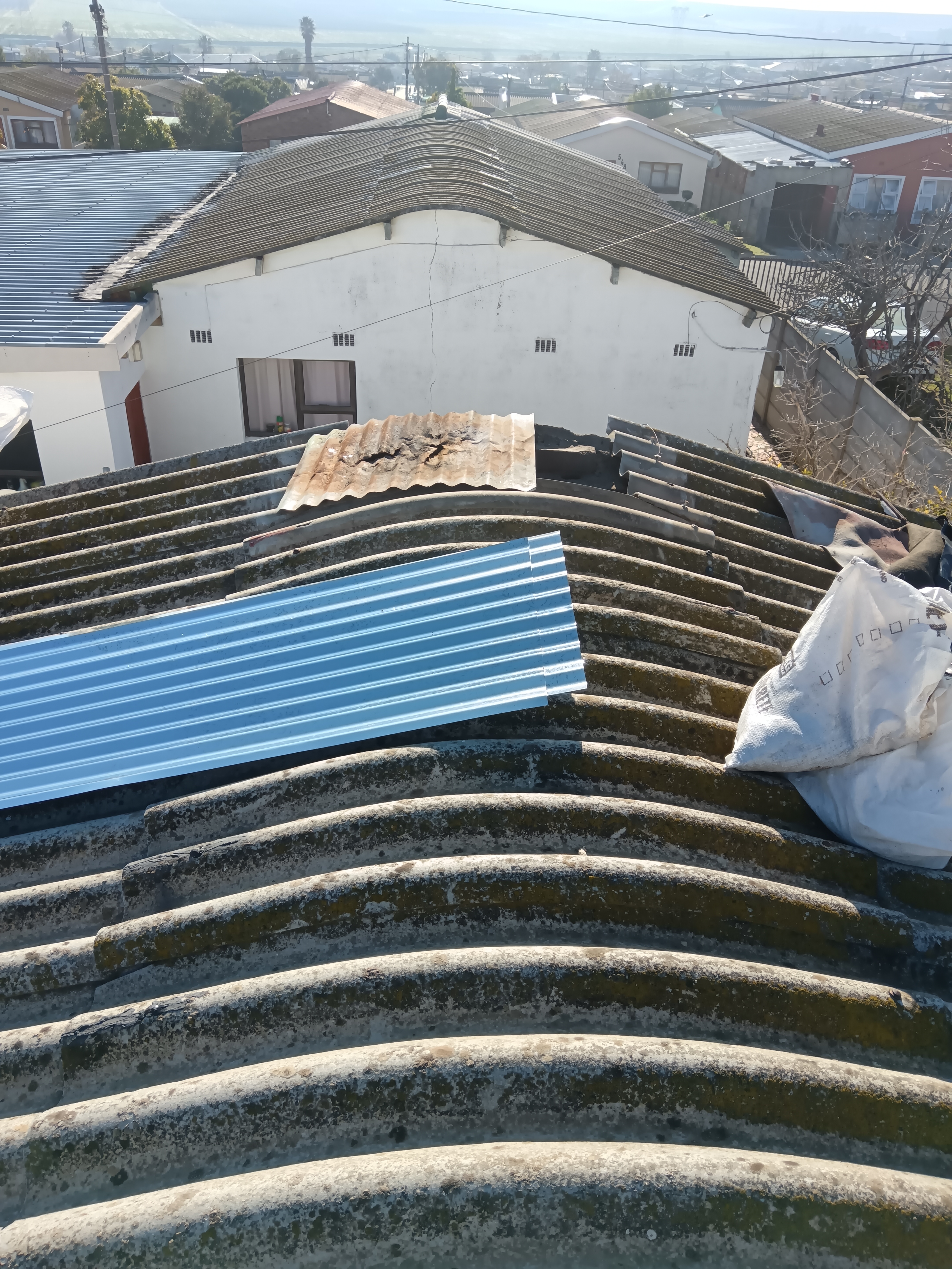Didnt get asbes roofsheets, client said that we can short it out , with  corrugated roofsheet. 
